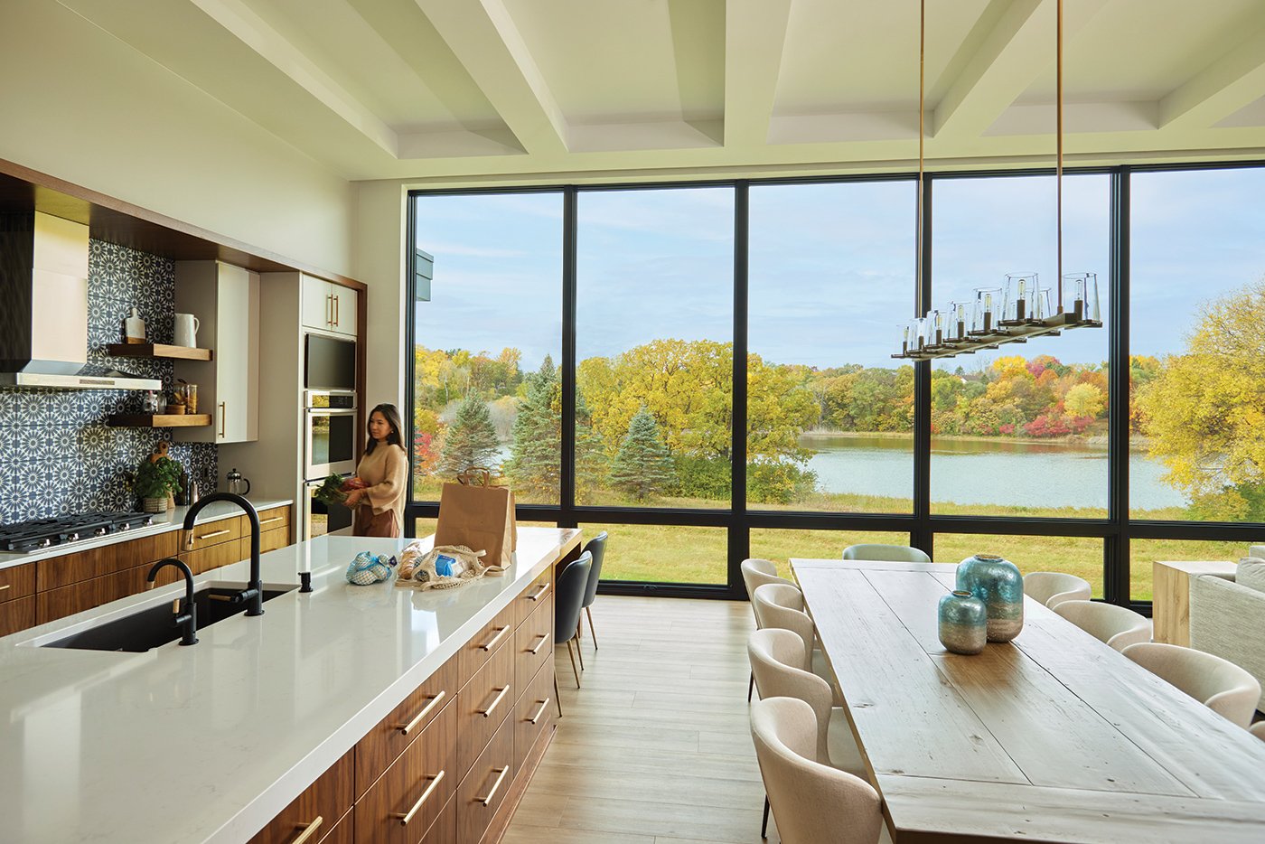 Open concepts kitchen with large picture windows highlighted by floor set awning windows 