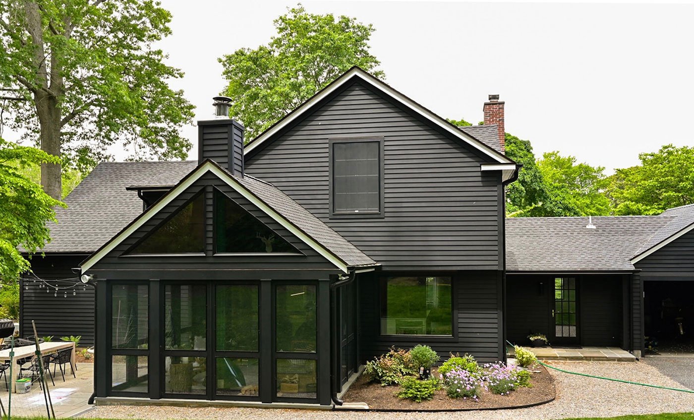 A modern home with large expanses of glass.