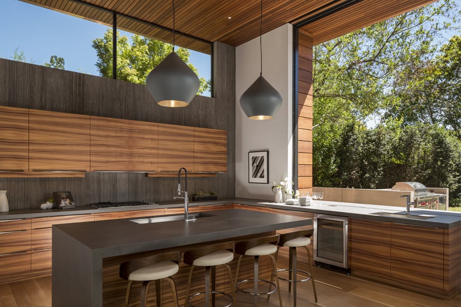 Modern kitchen with large Liftslide pass-through window going outdoors